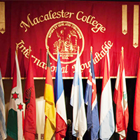 Photo of an International Roundtable table surrounded by flags