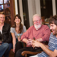 Photo of students and their professor at the professor's house