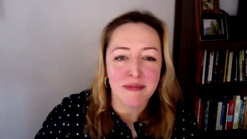 Staff member at Mac Day event