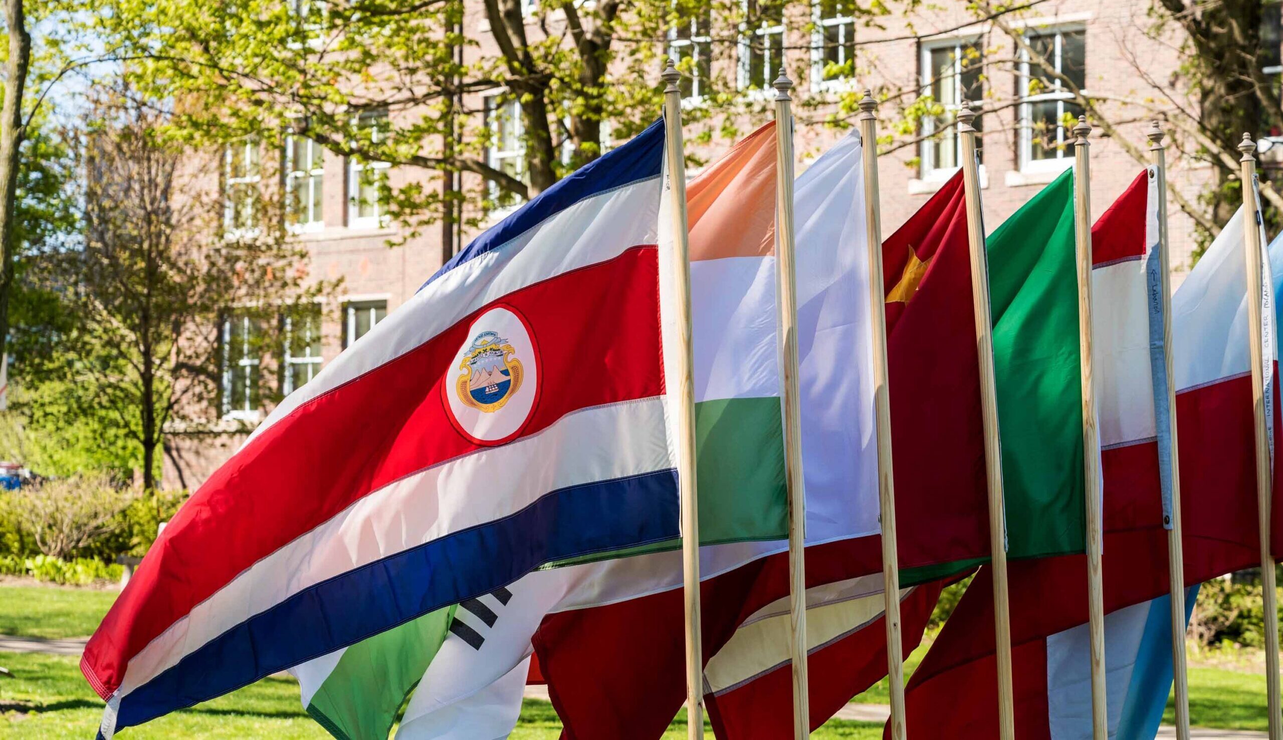 Seven flags on display on Mac's Great Lawn