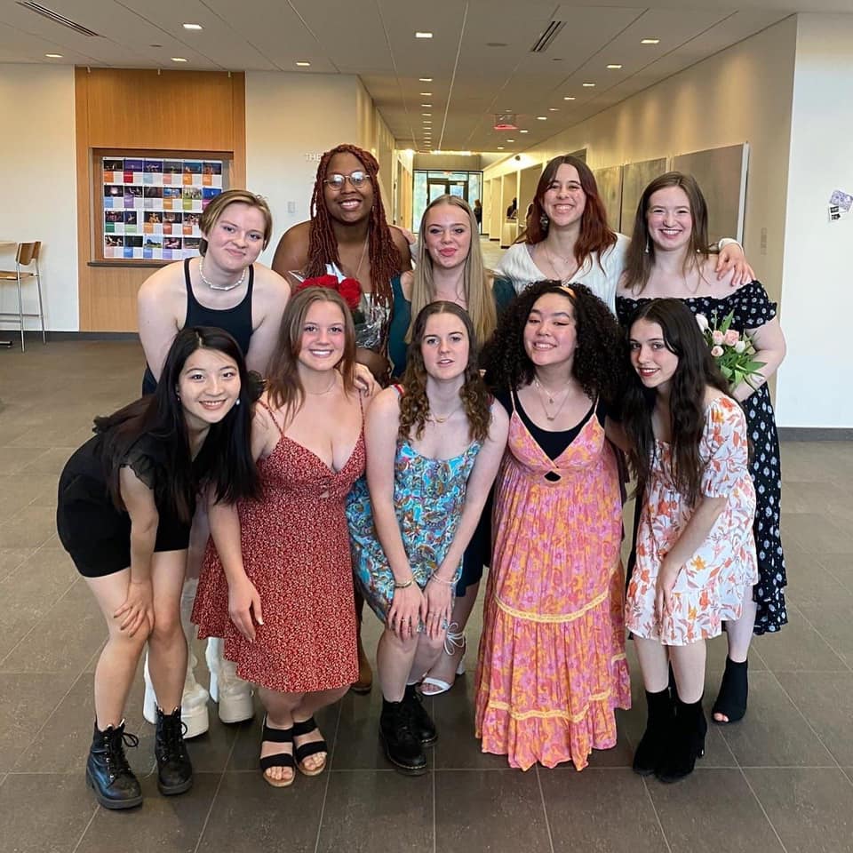 Photo of Macalester a cappella group the Trads singing.