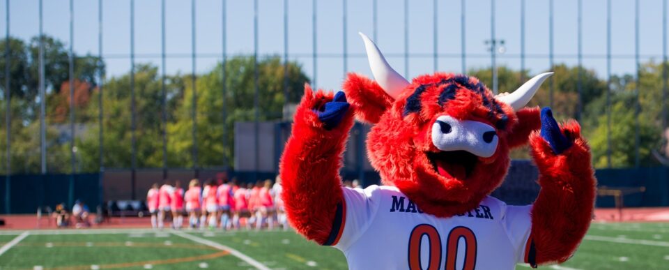 Coo mascot cheering
