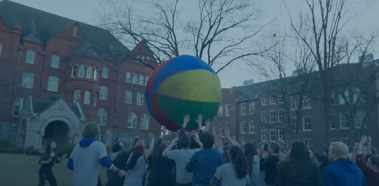 Macalester students play Pushball outside on the campus lawn.