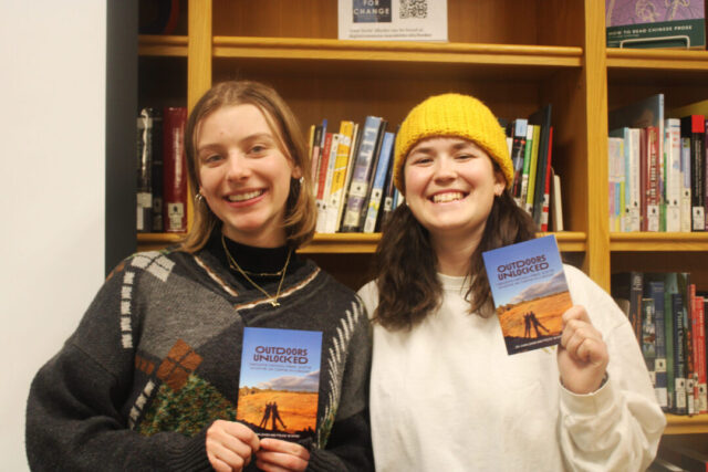 Two students posing - happy about their project
