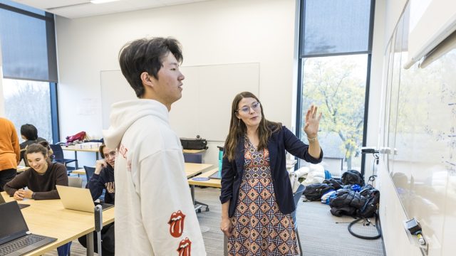 Student and Professor at whiteboard