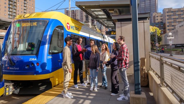 Students getting on light rail