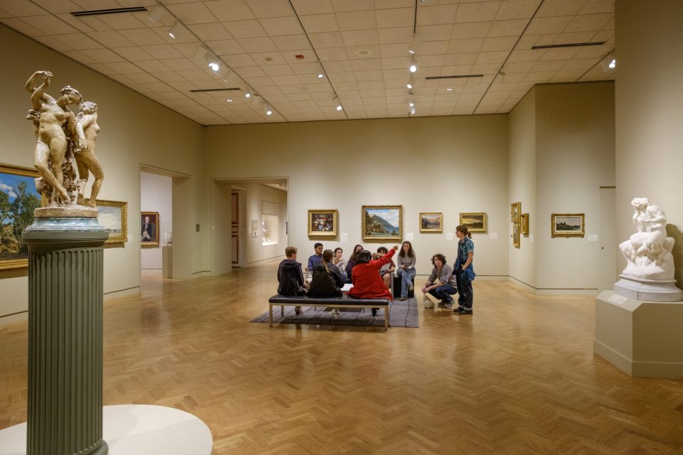 Students learning at museum