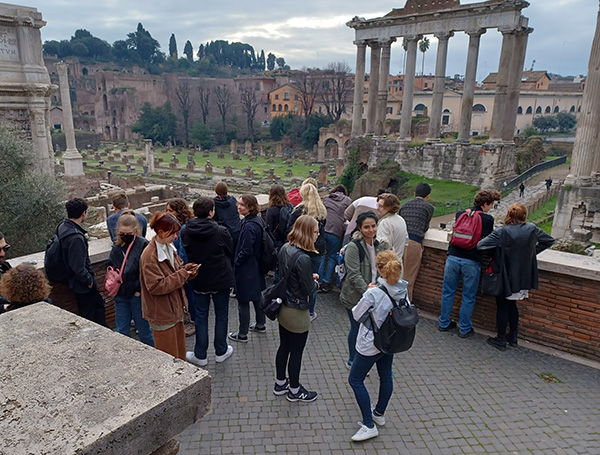 Group of students looking at an ancient site