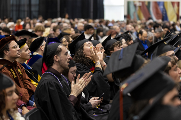 Graduates cheer during the 2025 Commencement ceremony.