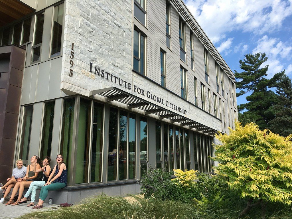 Macalester students in front on the Institute for Global Citizenship