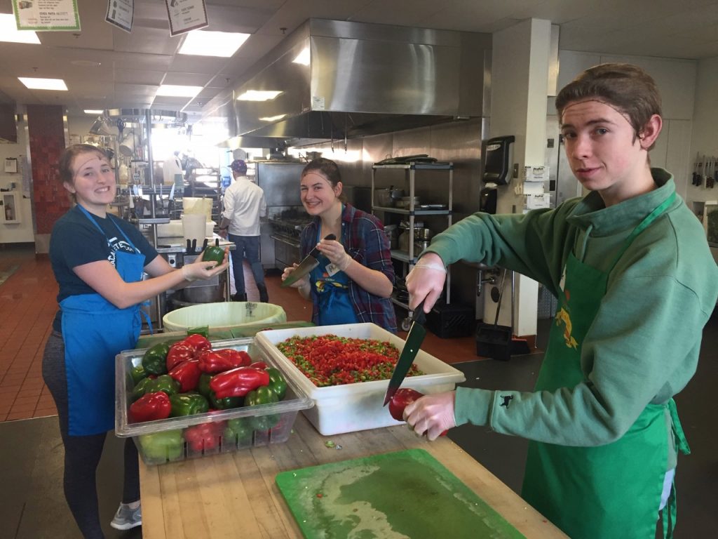 Students preparing food at a food pantry