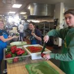 Students preparing food at a food pantry