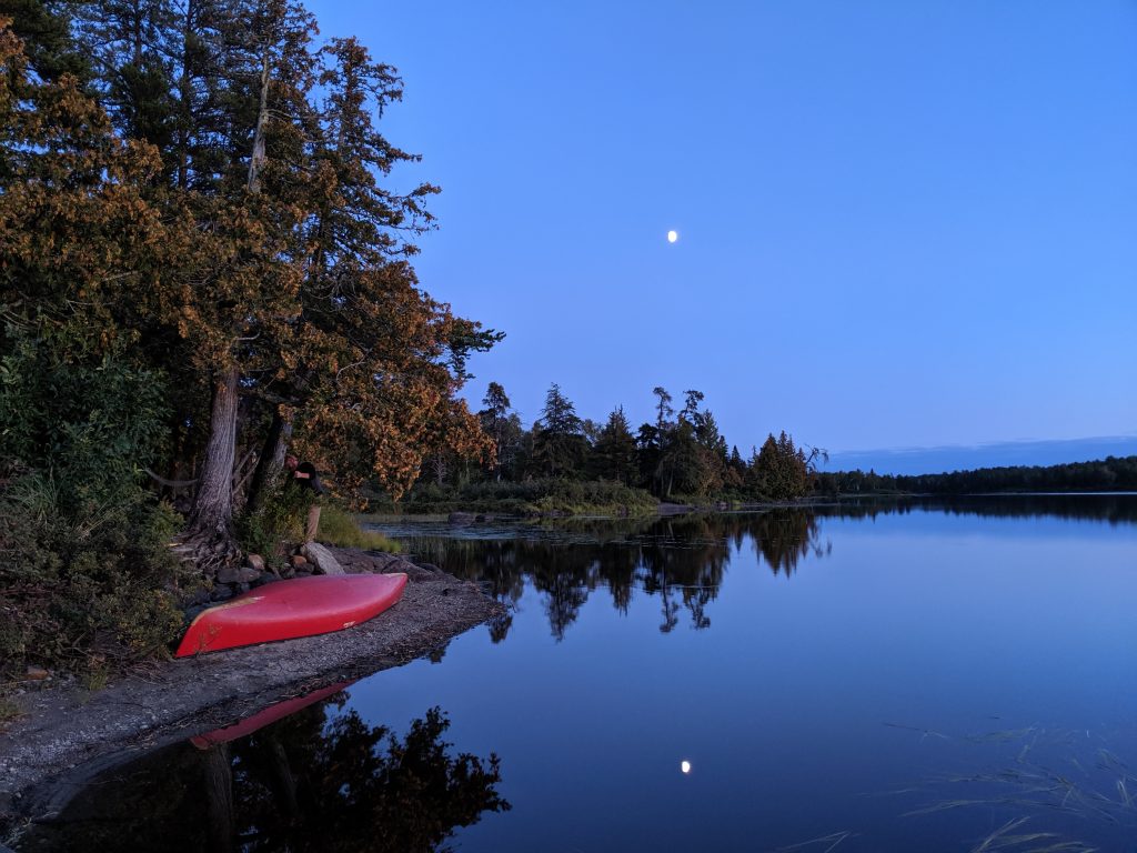 Photo of a canoe at dusk in the Boundary Waters Canoe Area Wilderness