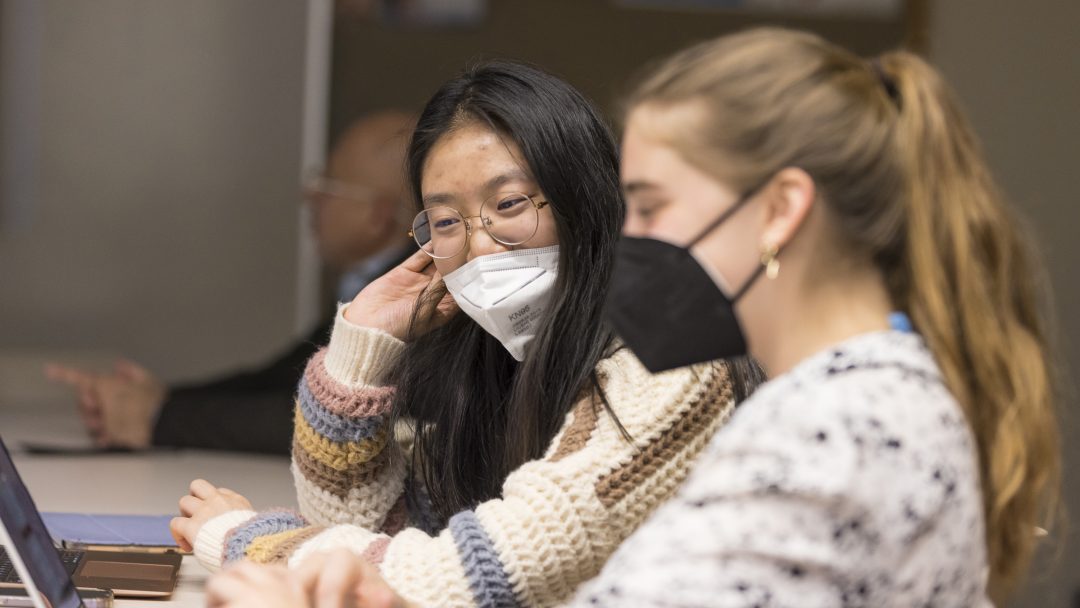 Two students sitting at a desk