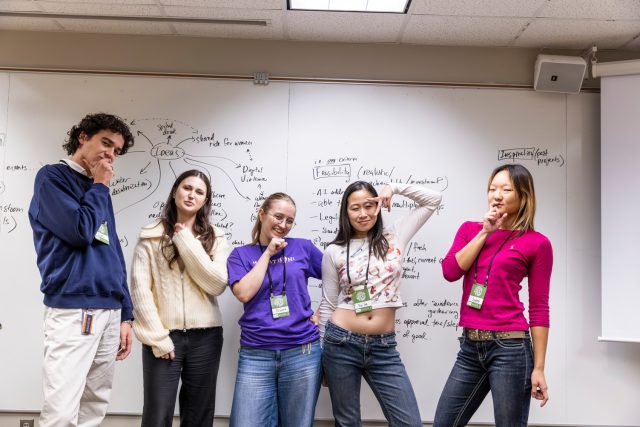 Five Macathon students thinking