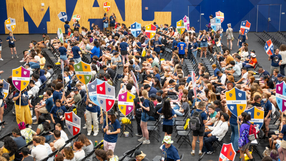 Macalester first years gather in the gym for Orientation