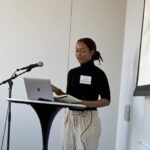 Photo of scholar Gabby Whitehurst presenting in Chicago.