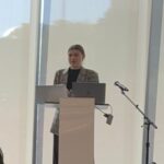 photo of scholar Isabel Saavedra Weis presenting in Chicago.
