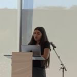 photo of scholar Neisy Rodriguez presenting in Chicago.