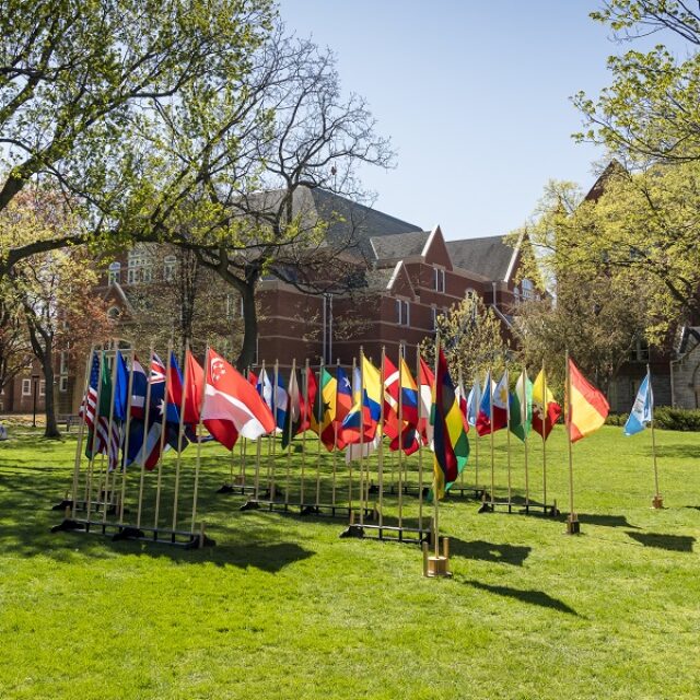 Flags in front of Macalester Buildings