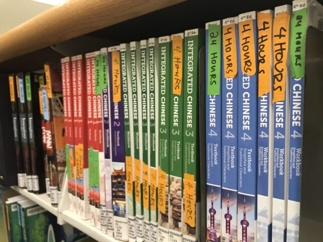 Course reserve text books on the shelf.