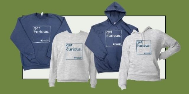Four sweatshirts with get curious logo on them