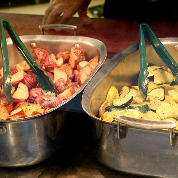 Pans of food in Cafe Mac.