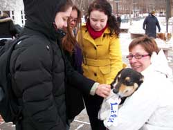 Macalester registrar Jayne Niemi and Lily help relieve stress at last December’s dog days