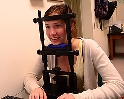 Photo of a student in the eye lab.