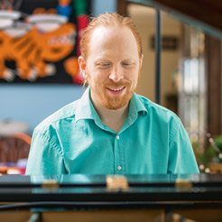 Paul Cantrell playing a piano