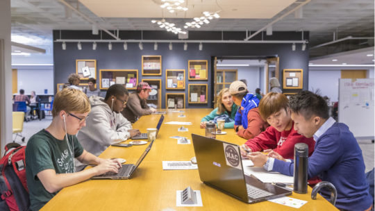 Students study and create on the second floor of the library.