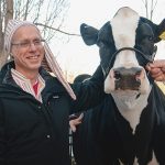 President Rosenberg leading a cow during his 2010 "President's Day" video