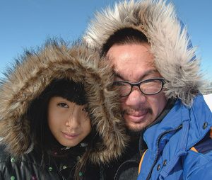 Photo of Bao Phi and his daughter