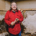Walter “Super” LaBatte Jr. tanning a hide