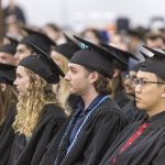 Graduating students listen from the audience at Macalester's 2022 Graduation.