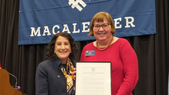 President Rivera stands with Brenda Piatz, recipient of the 2024 Staff Outstanding Service Award