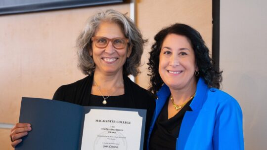 President Rivera stands with Jefferson Award recipient Professor Joan Ostrove