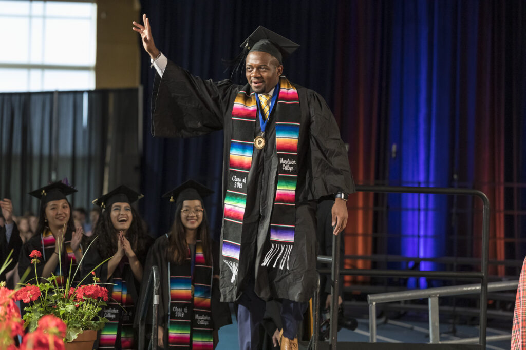 Mays graduating from Macalester College in 2019.