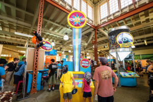 Fair-goers explore Mac’s CollectED project.