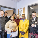 Executive Vice President and Provost Lisa Anderson-Levy stands with Professor Gardner and a group of supporters.