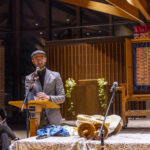 Demetrios Marcos Vital, the scribe who repaired the scroll, speaks at the welcoming ceremony.