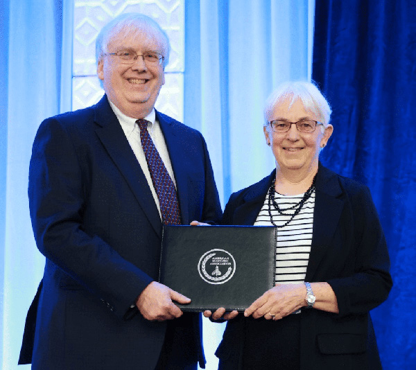 Timothy Taylor receiving an award