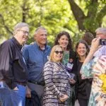 Group of alumni posing for a picture