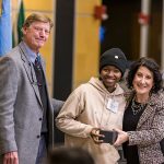 Phil Geier and President Rivera with a student