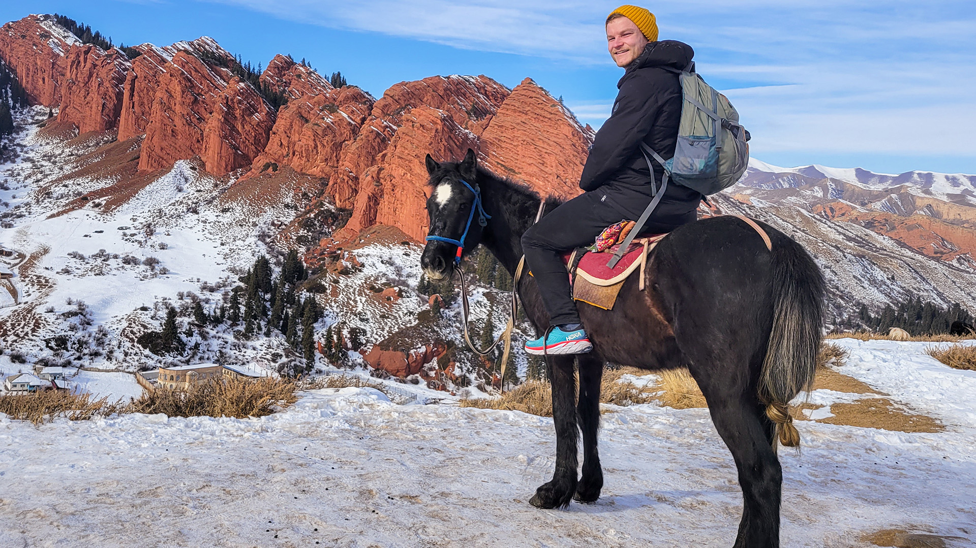Dan rides a horse in Issyk Kul.