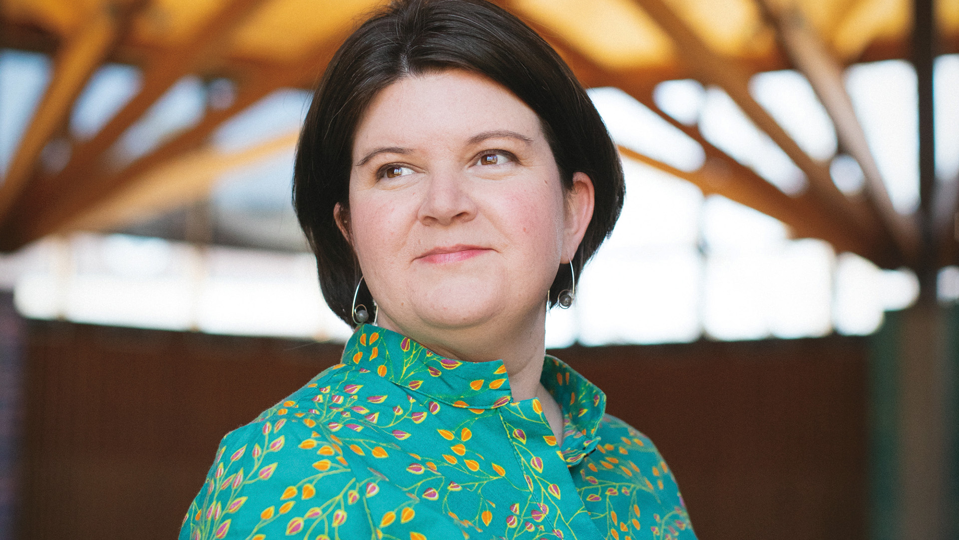 Chaplain Kelly Stone stands in Weyerhaeuser Chapel