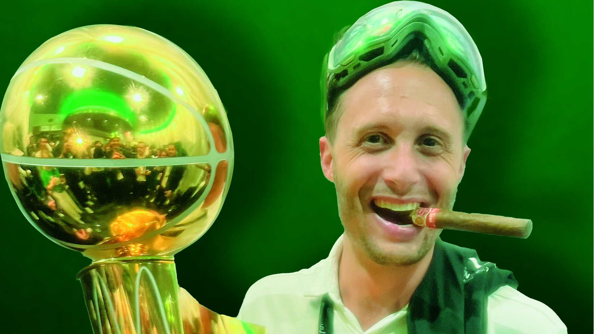 Dave Lewin '09 holds an NBA Championship Trophy and holds a cigar in his mouth