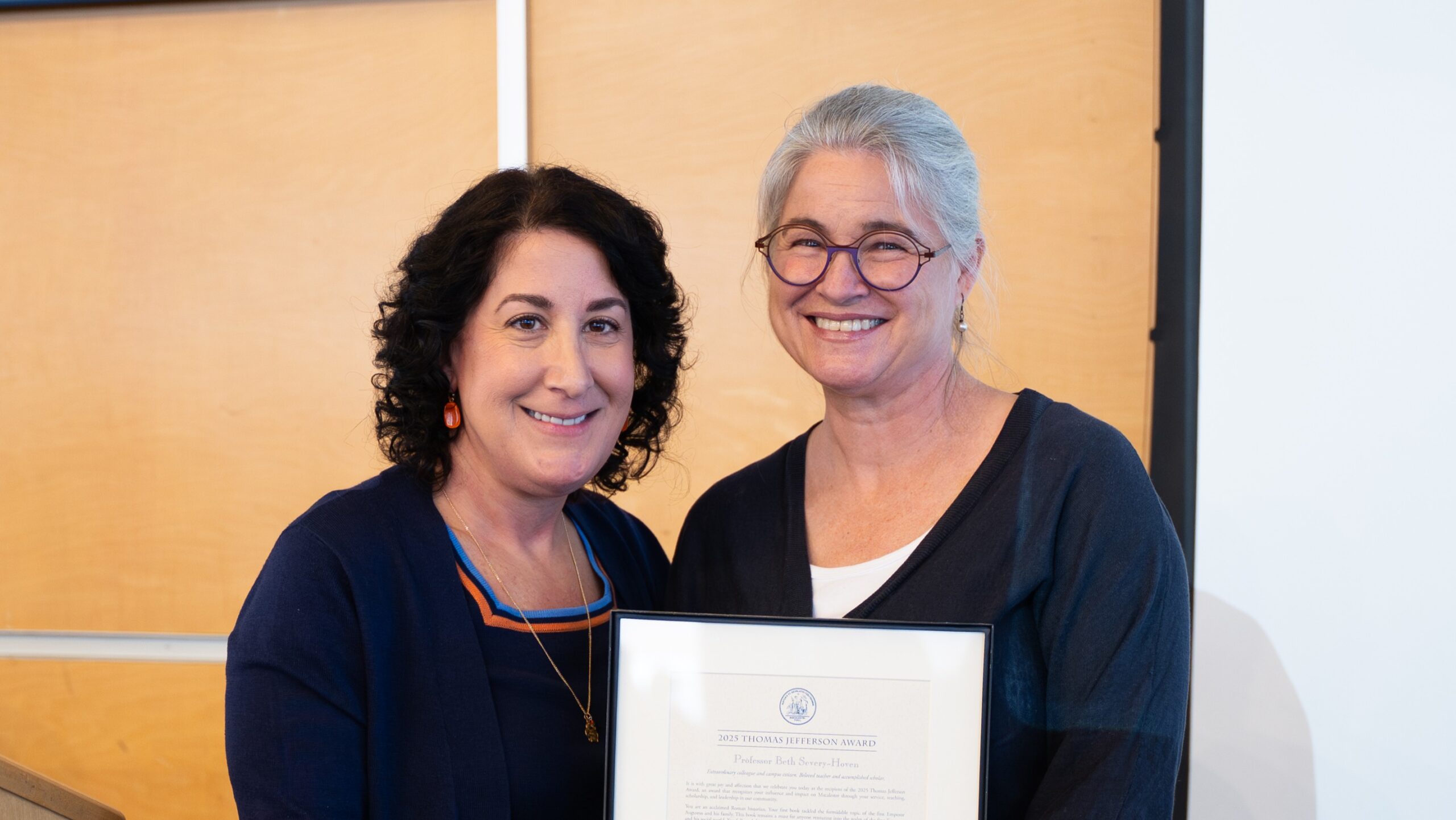 President Rivera stands with Jefferson Award recipient Dr. Beth Severy-Hoven.