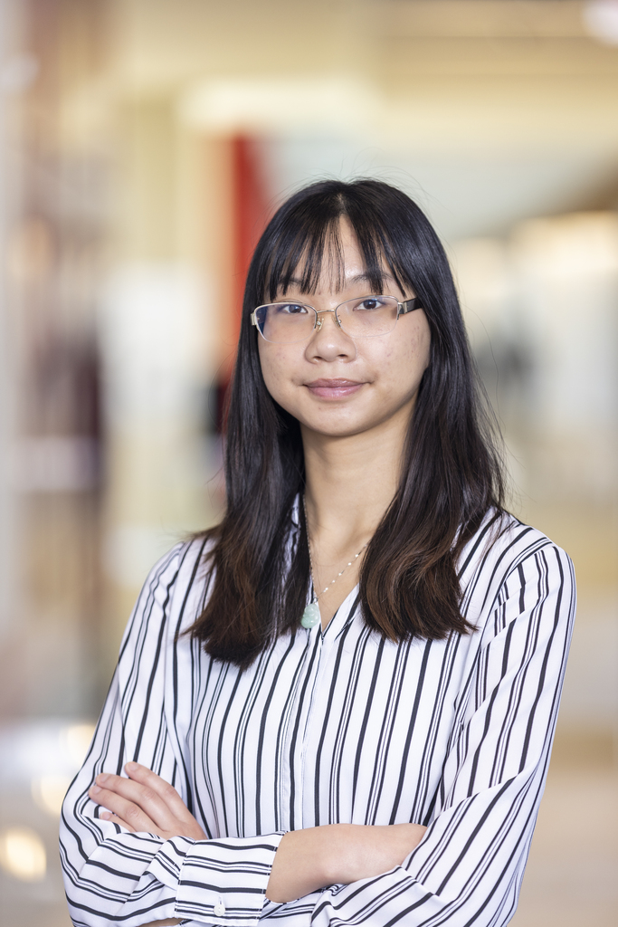 Lilly Lu ’25 poses for a headshot in the lobby of her Target office.
