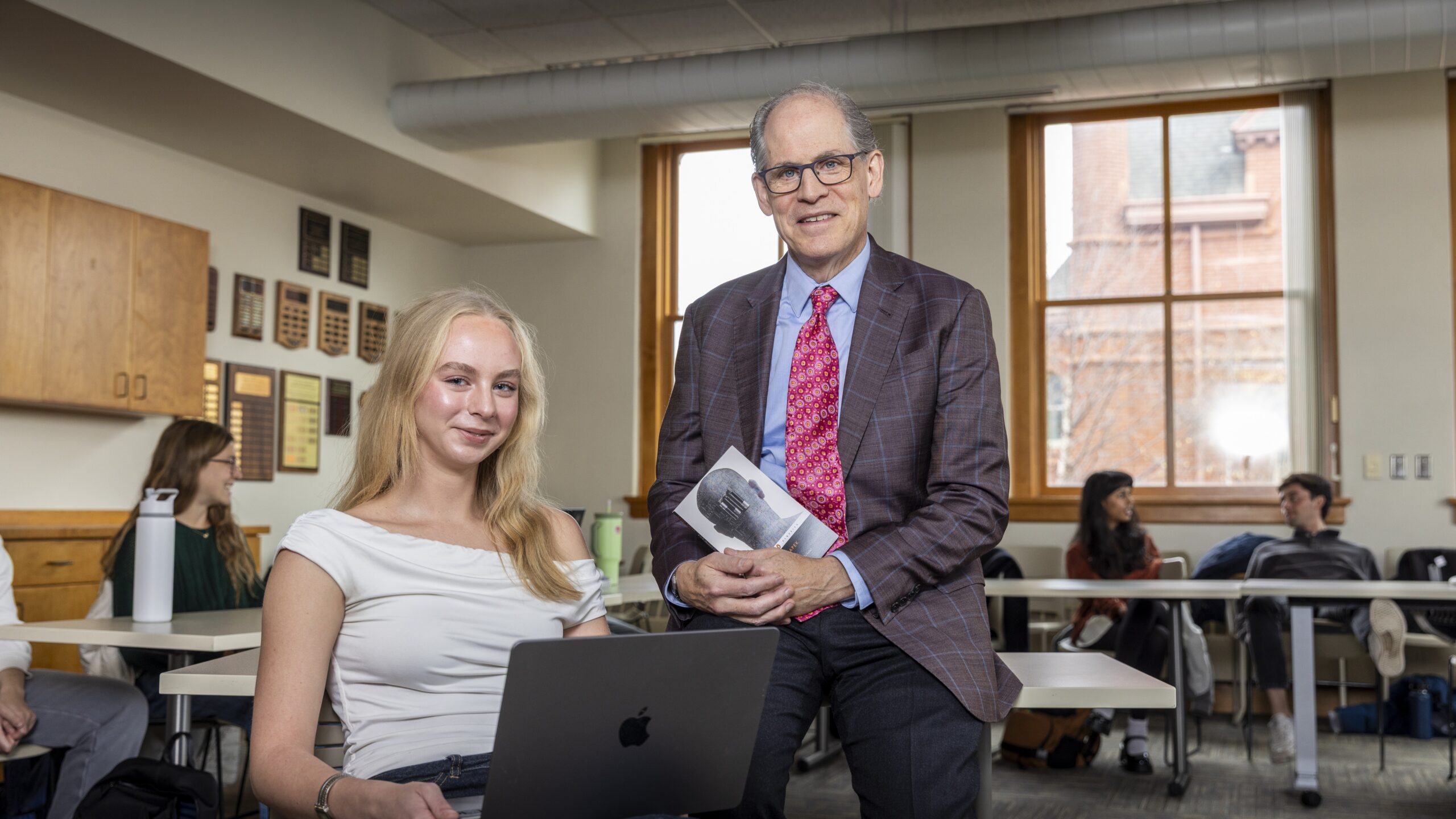 Professor David Moore and student Ellie Spangler collaborate on a course about artificial intelligence and ChatGPT at Macalester College.